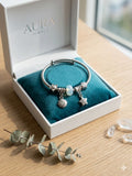 Sky blue charm brecelete